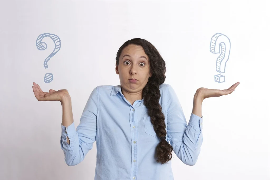 Confused woman deciding between PMP and PMI-ACP certification for 2025
